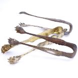3 19th century French silver-gilt sugar tongs, with lion paw terminals and engraved decoration,