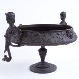 A 19th century patinated bronze tazza, with central relief cast medallion, rim diameter 20cm, height
