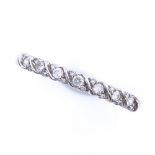 A modern 9ct white gold diamond half eternity ring, total diamond content approx 0.15ct, setting