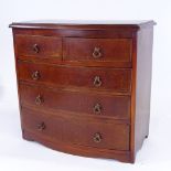 An Edwardian mahogany apprentice bow-front chest of drawers, with brass drop handles, width 37cm,
