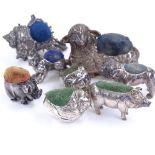 A group of novelty silver pin cushions, figural designs including pig, Bulldog, sheep and chick,