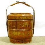 A Chinese painted and gilded wood food carrier, with cane-bound bamboo carrying handle, diameter