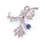 An early 20th century unmarked rose gold silver-topped sapphire and rose-cut diamond floral spray