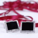 A pair of Art Deco style 18ct white gold onyx and diamond cluster cufflinks, geometric form, set