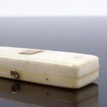 A small Georgian ivory and gold inlaid toothpick case, length 6cm Crack in the ivory along the