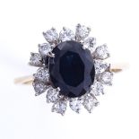 A late 20th century 18ct gold sapphire and diamond cluster snowflake ring, total diamond content
