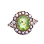 A 19th century unmarked gold peridot and split pearl cluster ring, setting height 13.5mm, size L,