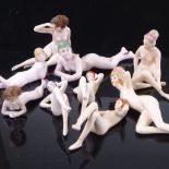 A group of bisque porcelain nude bathing girl dolls, circa 1920s, largest length 11cm (9) One doll
