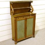 A Regency rosewood chiffonier of small size, with brass galleried open shelves above, 2 frieze