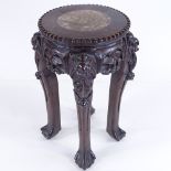 A Chinese carved hardwood jardiniere stand of small size, with inset marble top, height 37cm,