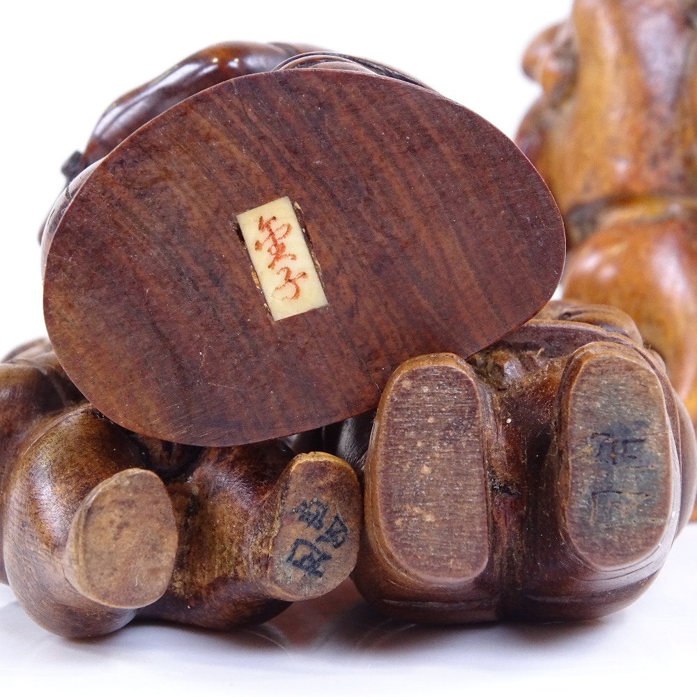 A group of Japanese carved wood netsuke and okimono, including a rat carrying a backpack, height 6cm - Image 3 of 3