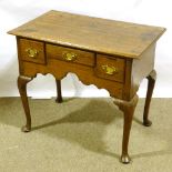 An 18th century oak lowboy, with 3 frieze drawers, shaped apron and cabriole legs, 79cm x 47cm,