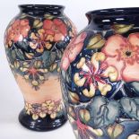 A large pair of Moorcroft Pottery vases, dated 1995, height 41cm Perfect condition