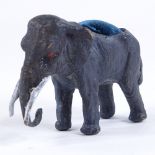 A cold painted bronze elephant design pin cushion, length 7cm