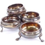 A group of 5 Georgian silver salt cellars, plain circular form raised on 3 shell feet, diameter 6cm,