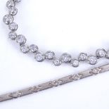 A modern sterling silver and CZ zigzag necklace, and a sterling and CZ line bracelet, necklace