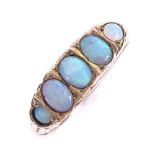 An early 20th century 9ct gold graduated 5-stone cabochon opal half-hoop ring, hallmarks Chester