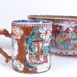 A Chinese famille rose porcelain bowl, 29cm across, and an 18th century porcelain pint mug (2) (A/F)