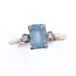 A late 20th century 18ct gold 3-stone blue topaz and diamond dress ring, topaz length 7.3mm, size J,