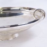 A George VI Art Deco circular silver table centre fruit bowl, plain circular form with ring handles,
