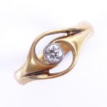 An early 20th century 18ct gold solitaire diamond dress ring, Art Nouveau style pierced settings,