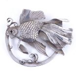 ARNE OSCAR BURMAN - a Vintage Danish stylised silver fish brooch, engraved decoration with garnet