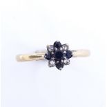 An early 20th century 18ct gold sapphire and diamond cluster flowerhead ring, setting height 7.