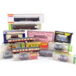 A collection of N gauge tenders and locomotives, mostly boxed