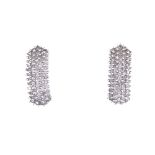 A modern pair of 9ct white gold diamond cluster stud earrings, earring height 15.7mm, 2.4g Both in