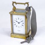 A brass-cased carriage clock timepiece, examined by Mappin & Webb, white enamel dial with Roman