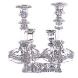 A pair of Victorian silver plate on copper telescopic table candlesticks, and a pair of silver