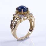 A modern 9ct gold cabochon sapphire and diamond dress ring, setting height 13.9mm, size N, 5.1g Good