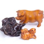 3 Japanese carved wood pig netsuke, largest length 5.5cm (3)