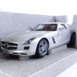 A diecast Mercedes-Benz SLS-AMG McLaren Edition signed by Sir Stirling Moss, Limited Edition no 1 of