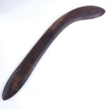 A Tribal hardwood throwing spear/boomerang, with engraved stylised turtle design, probably 20th