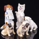 A group of porcelain dog ornaments, including Doulton seated Terrier, height 9.5cm, 3 Doulton and