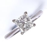 A 1ct Princess-cut solitaire diamond ring, set in plain 4-claw 18ct white gold settings, colour