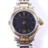 GUCCI - a lady's gold plated stainless steel 9040L quartz wristwatch, black and white speckled