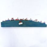 Ian McKay, painted wood wall sculpture, victors fleet, length 26", and a small sculpture, rocking