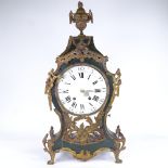 A large 19th century French green painted wood and brass 8-day mantel clock, white enamel dial