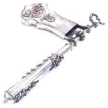 JUDAICA - a silver rattle, relief stone set decoration with Star of David handle and marks on