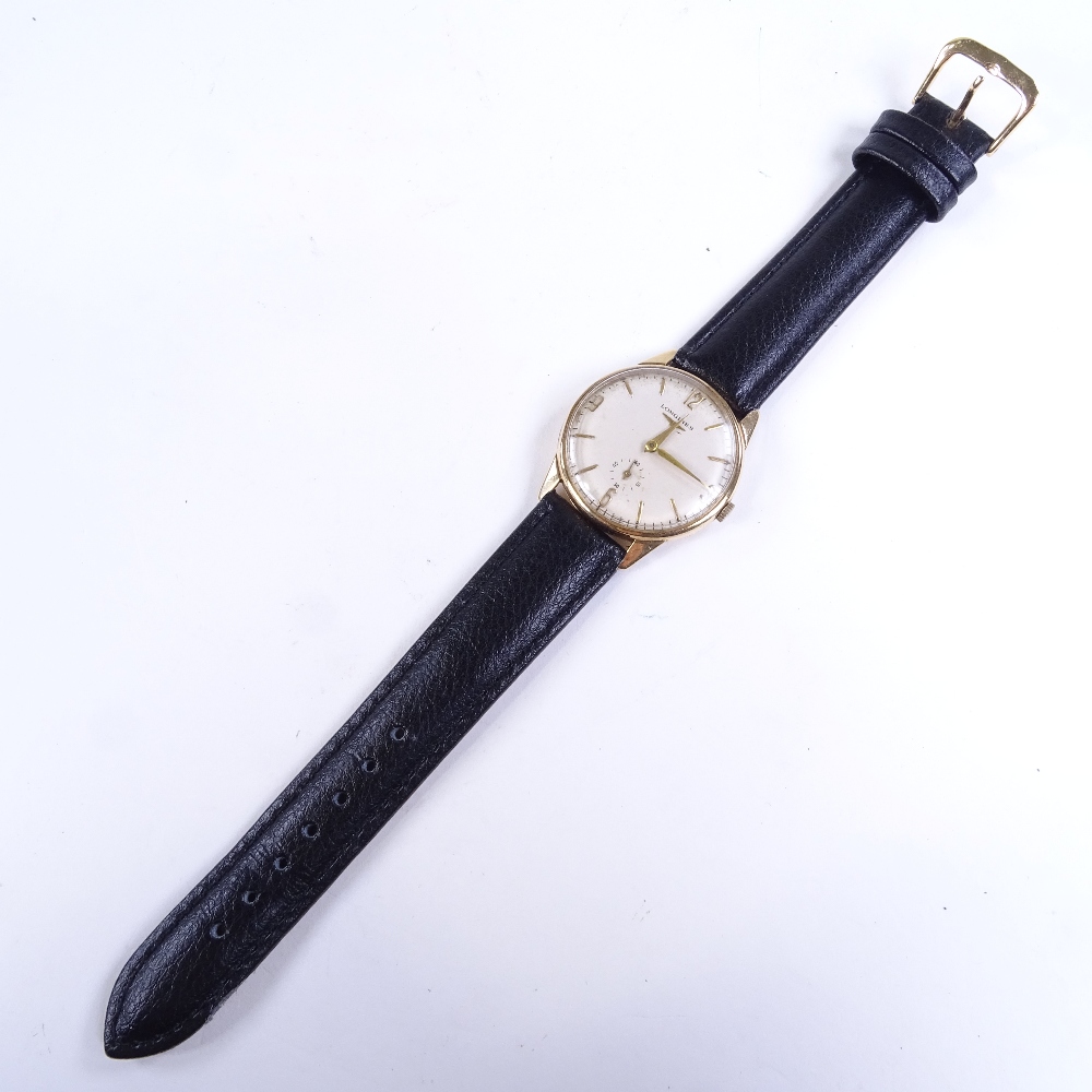 LONGINES - a Vintage 9ct gold mechanical wristwatch, silvered dial with gilt quarterly Arabic - Image 2 of 5