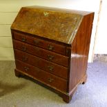 A George III walnut bureau, stepped fitted interior with secret drawers and well, 4 long drawers
