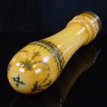 A 19th century ivory and brass pique-work handle from a Regency dandy cane, with screw-top