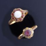 A 22ct gold garnet and pearl cluster dress ring, setting height 8.9mm, size M, 2.9g, and a 9ct