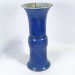 A Chinese blue glazed beaker vase with cherry blossom and bird decoration, 6 character marks to