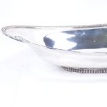 A George V oval silver fruit bowl with gadrooned rim and foot, by Barker Brothers Silver Ltd,