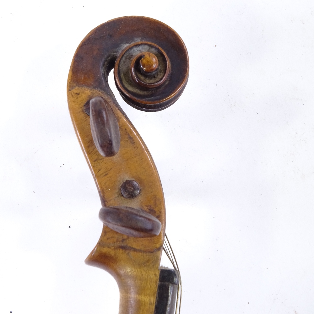 An 18th century violin, indistinct label with date 1703/09?, back length 35cm, with bow and case - Image 10 of 15