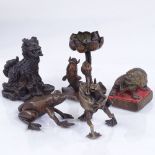 A group of miniature Japanese bronzes, including a seated Dog of Fo, height 5.5cm, a carp under a