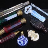 A group of mainly 19th century glass scent bottles, including ruby and green double-ended, and an